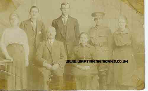 <p>Jesse Heaton in uniform with Ethel Alice, Walter Vernon, Levi [seated], James Barton, Mary Alice Barton (Heaton)[seated] and Margaret Heaton (Shaw) in 1918